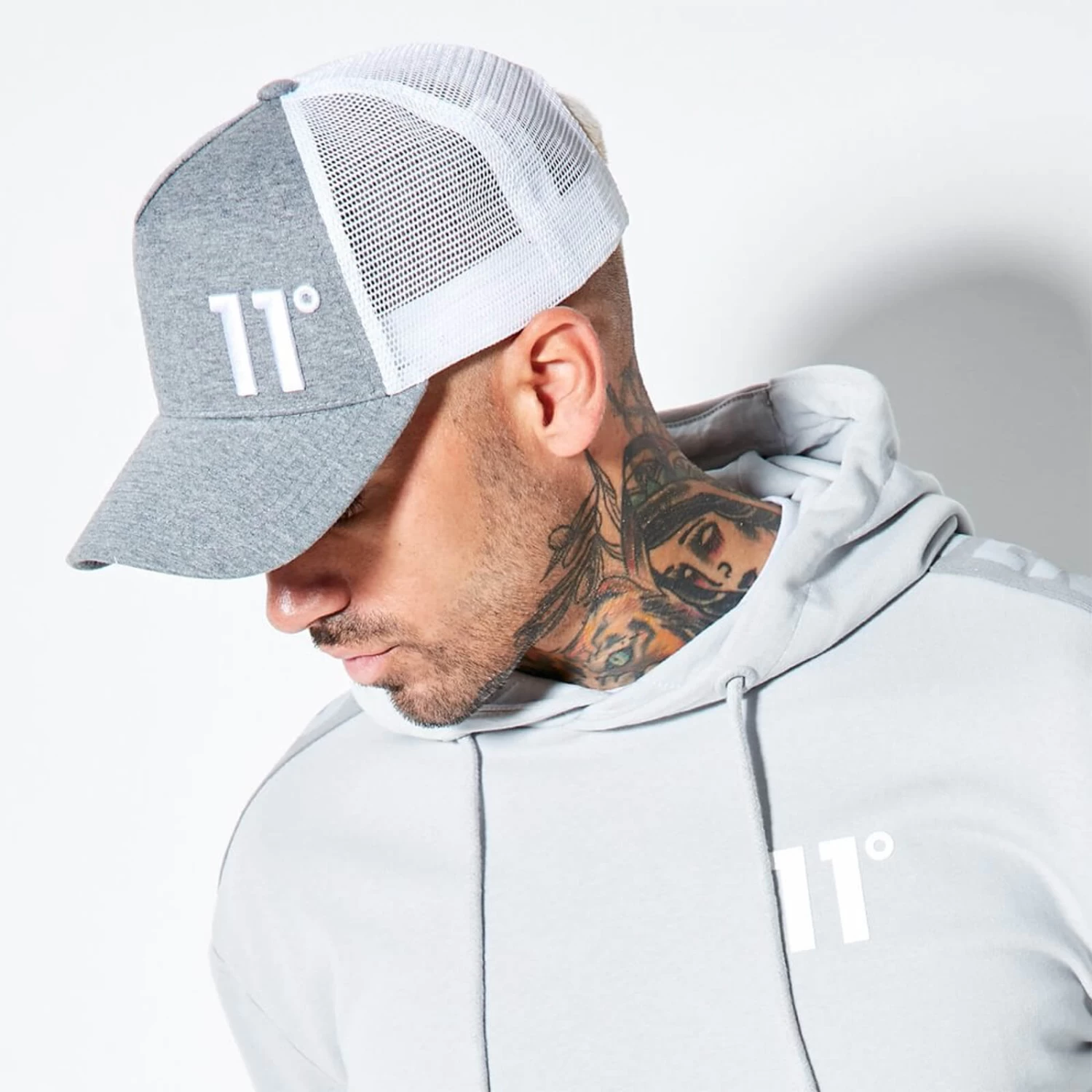 11 Degrees Trucker Cap High Build Logo – Charcoal Marl 1 11 Degrees Trucker Cap High Build Logo – Charcoal Marl