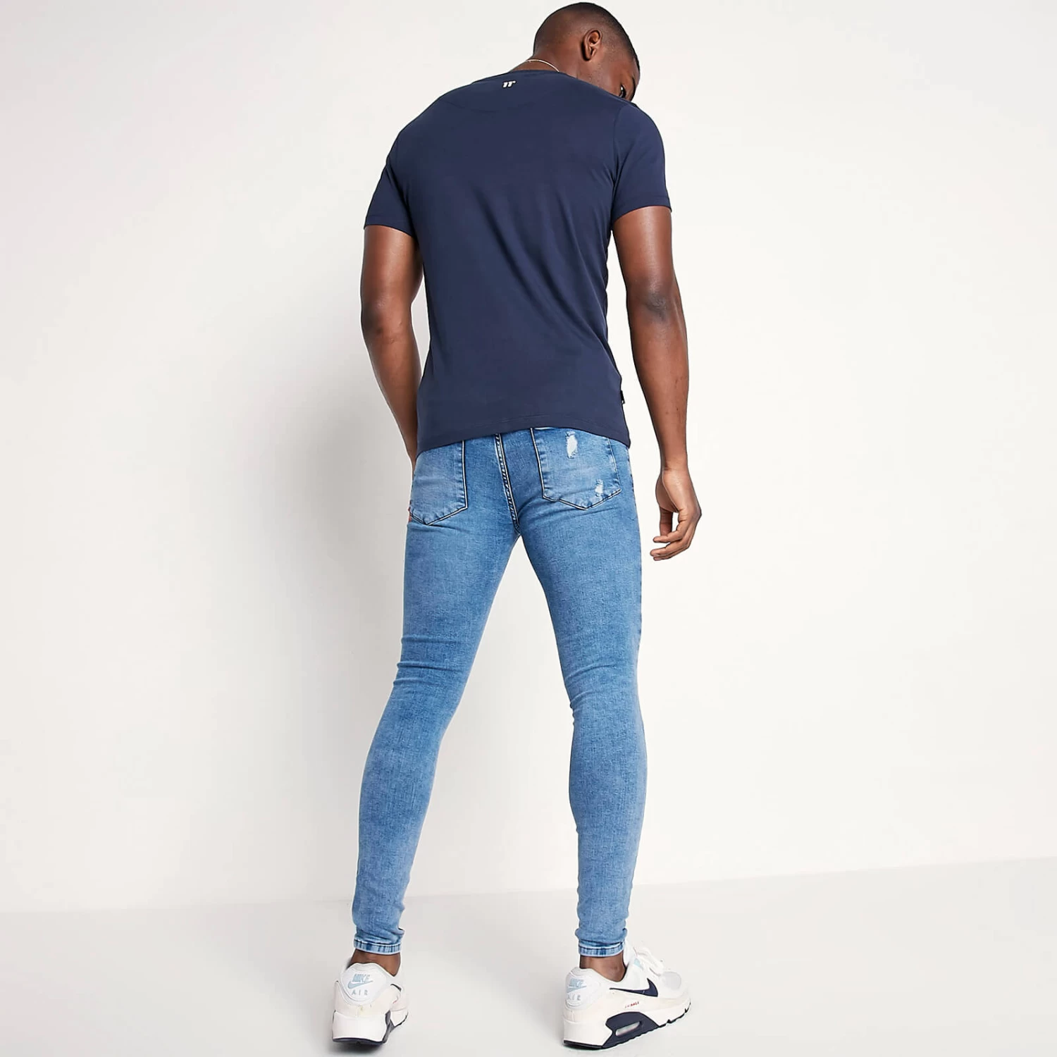 11 Degrees Sustainable Distressed Jeans Skinny Fit – Mid Blue Wash 4 11 Degrees Sustainable Distressed Jeans Skinny Fit – Mid Blue Wash - Image 4