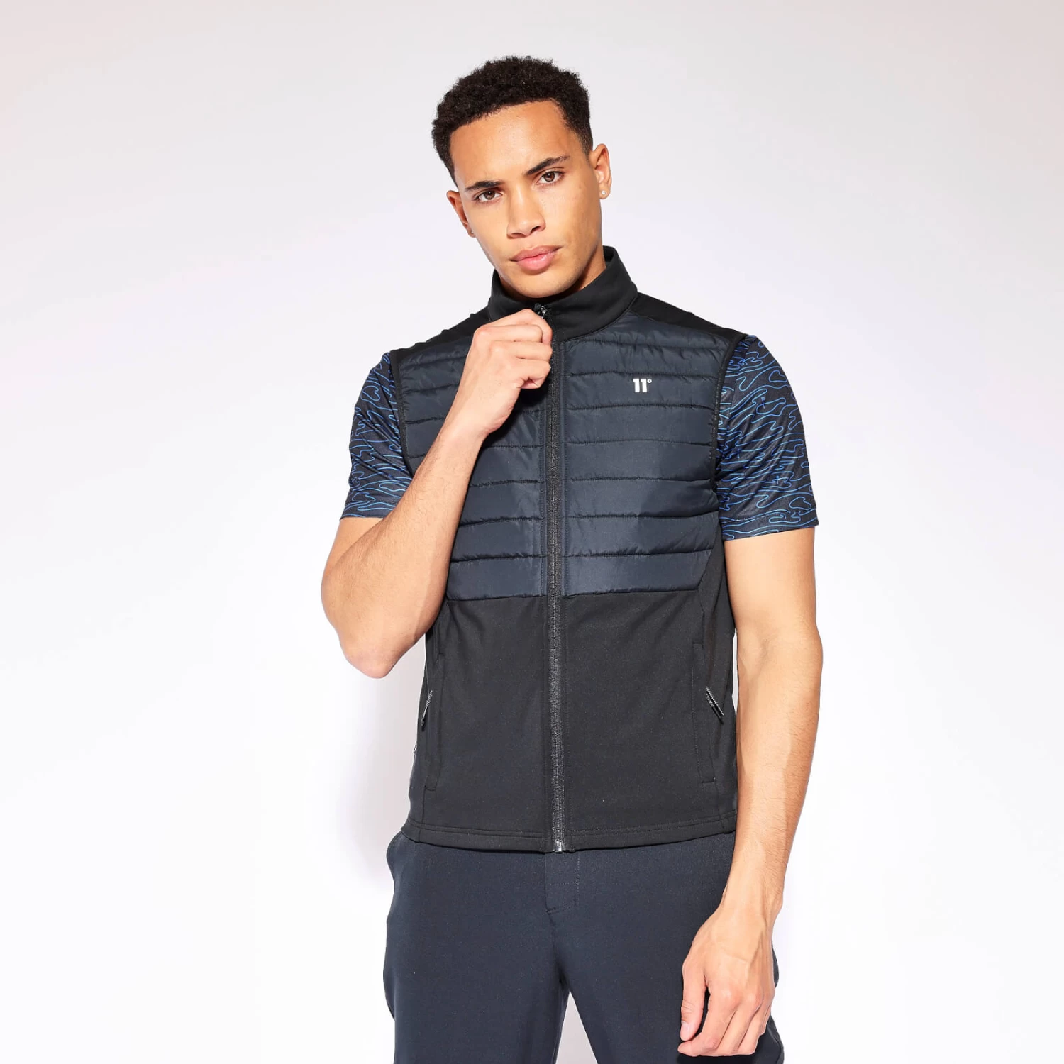 11 Degrees Lightweight Hybrid Gilet - Black 1 11 Degrees Lightweight Hybrid Gilet - Black
